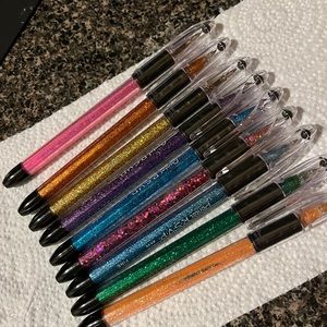 Glitter pens. Black ink available. Many colors available!